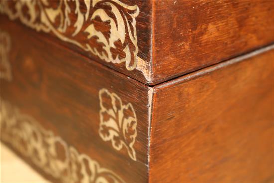 A Victorian rosewood and mother of pearl work box and sewing accessories 12 x 28cm